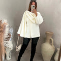Bouclé Poncho met Sjaaldetail – Vivienne